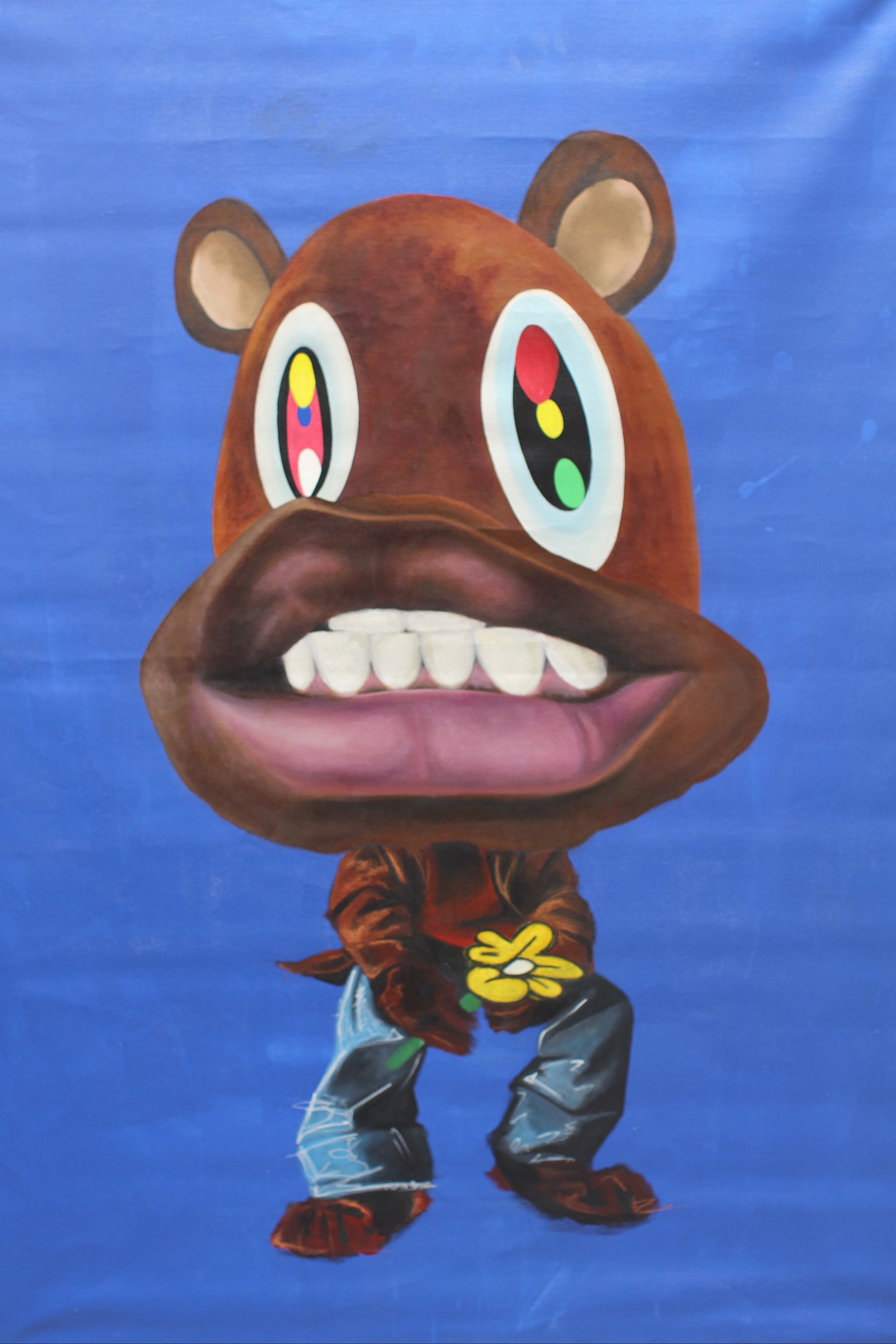 College Dropout and Graduation Bear holding custom sunflower motif.